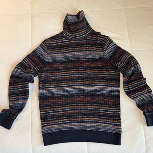 Paisley & Gray Vibrant Striped Turtleneck Sweater